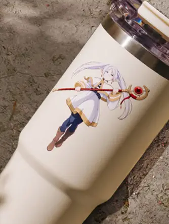 Close-up of Frieren character print on cream tumbler