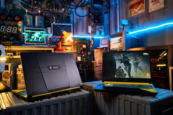 MSI x Rainbow Six Extraction Edition Crosshair 15: Featuring iconic REACT fluorescence yellow and tactical textures.
