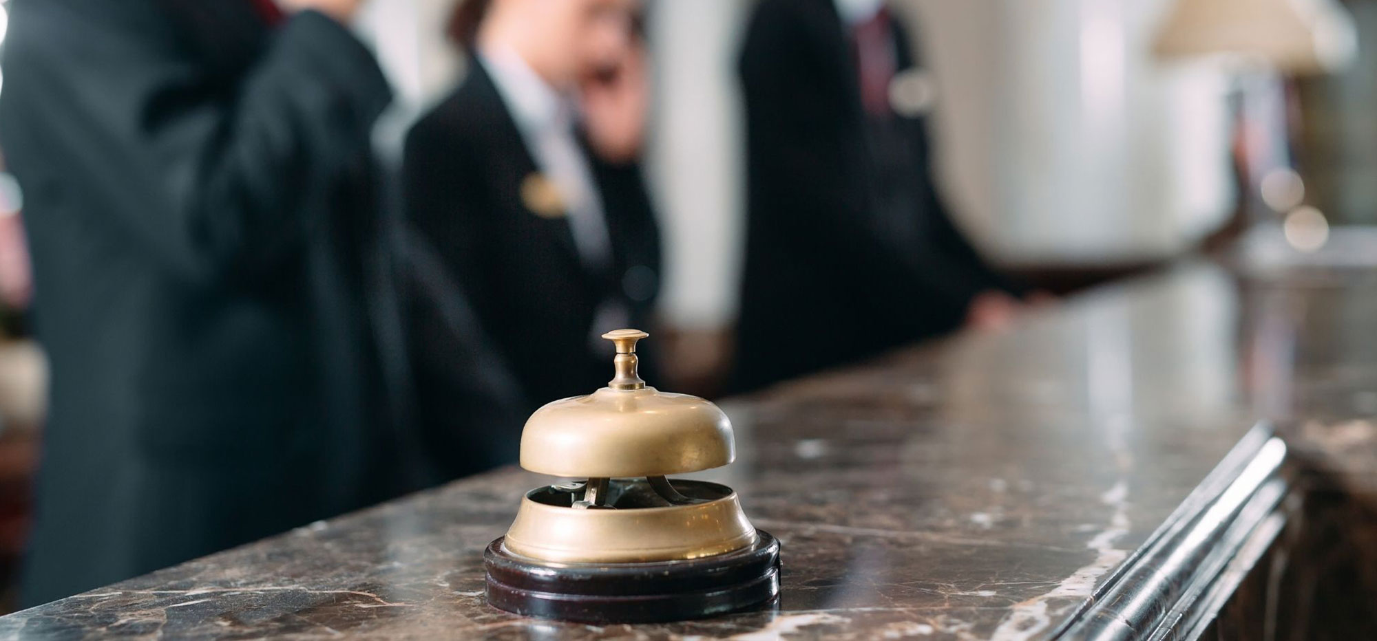Busy hotel staff are ready and waiting for travelers.