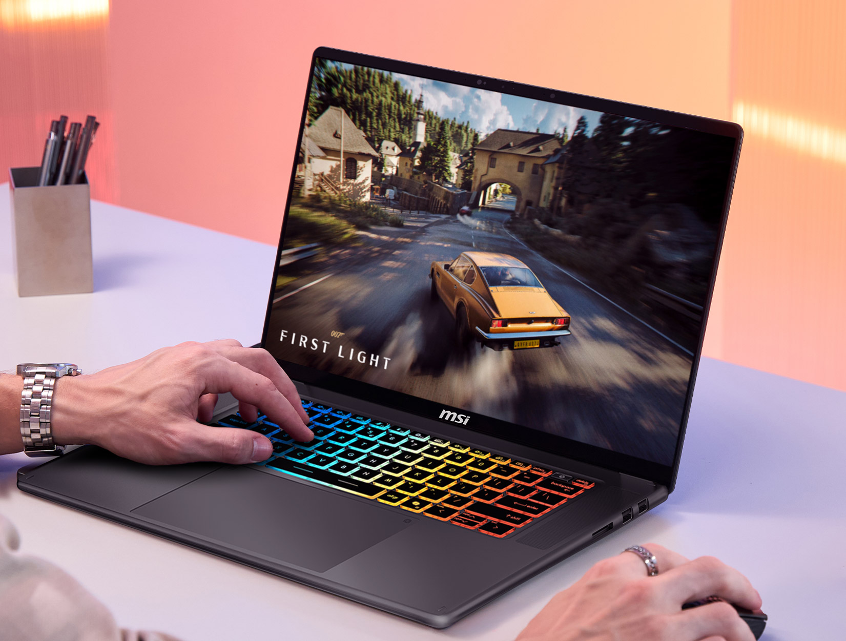 Developer coding across dual monitors with AI assistance
