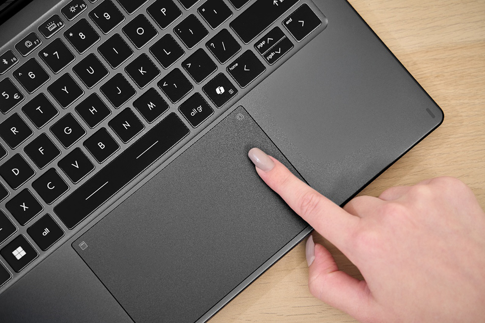 A large, precision-engineered Action Touchpad enables smooth, accurate gestures—designed for comfortable control during long work sessions.