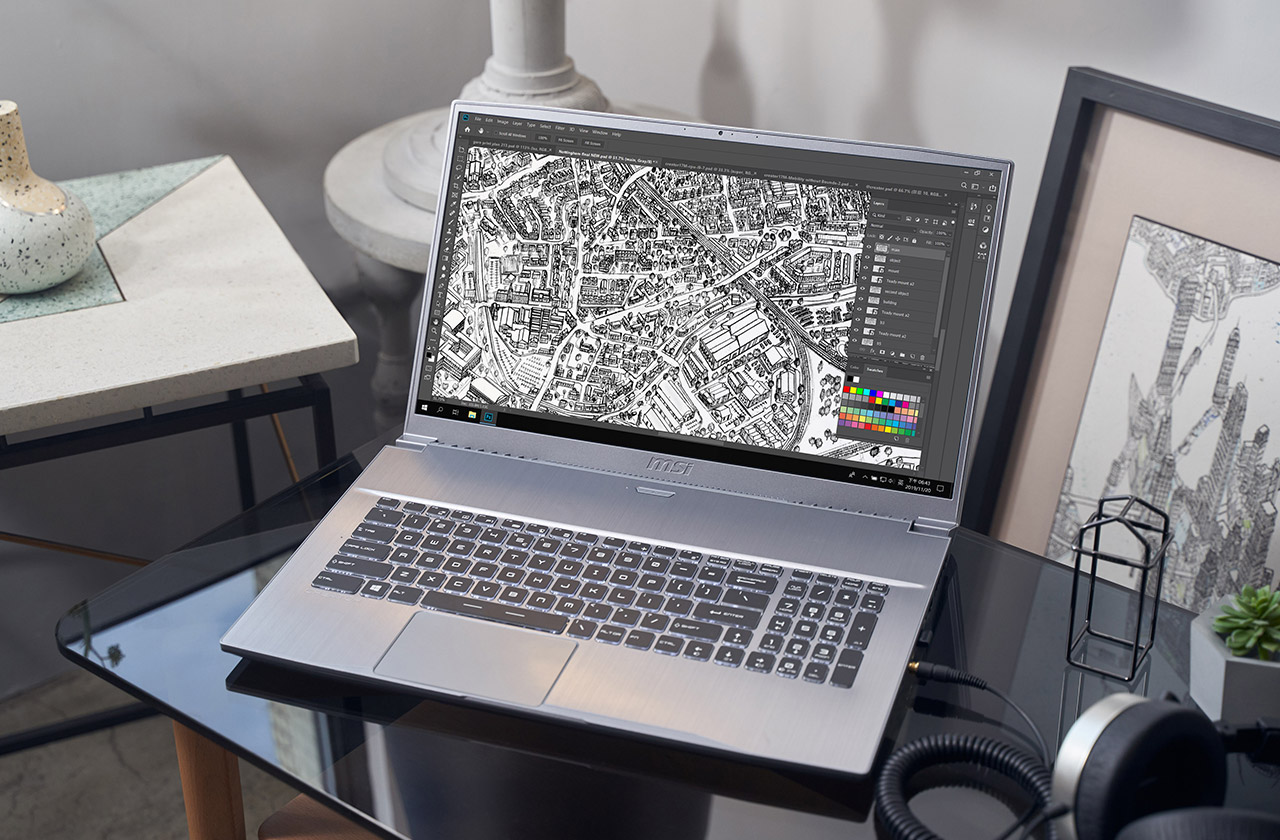 Creator 17 Laptop on table with art doodle.