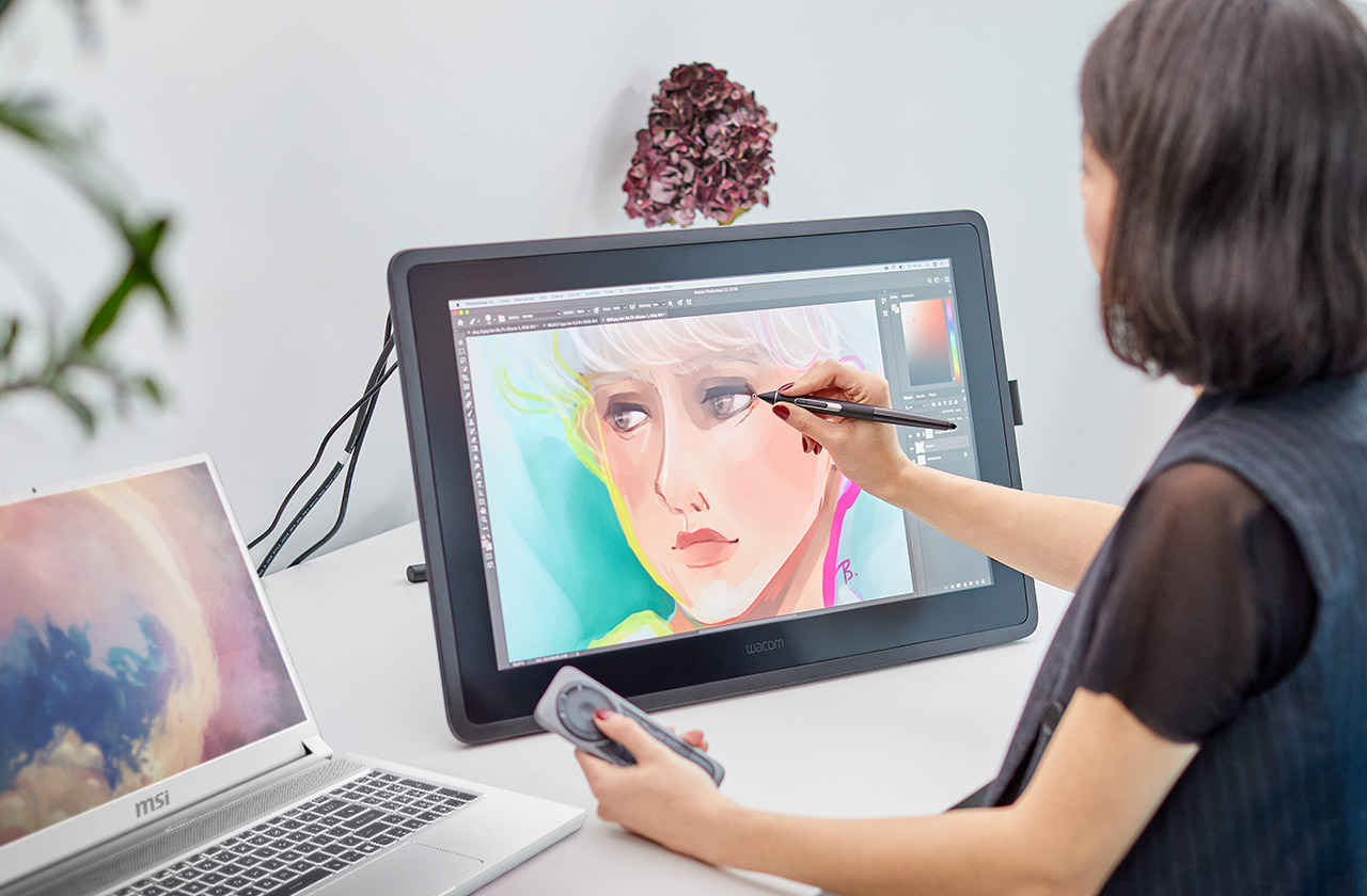 Artist using Cintiq 22 with Msi P75 Creator Laptop.